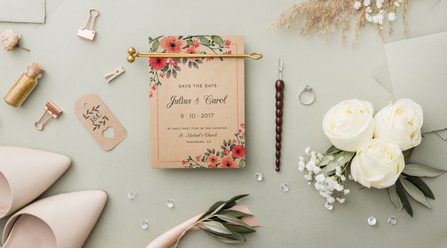 flat-lay-composition-wedding-elements-with-card-mock-up_23-2148502021